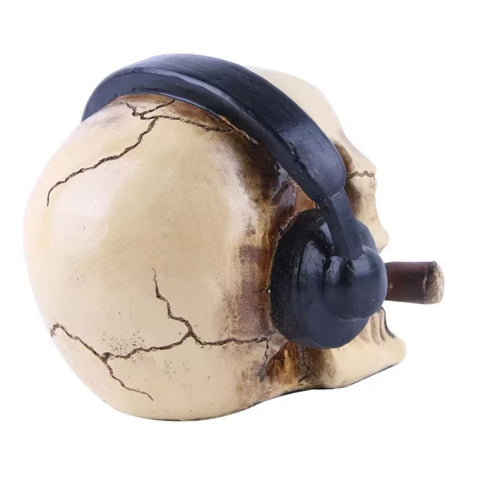 Statue tête de mort / crâne avec casque audio et cigare 14 cm