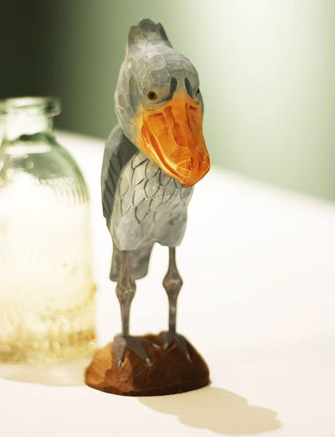 Statue oiseau cigogne à tête de baleine en bois 16 cm