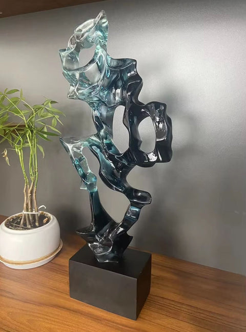 Sculpture abstraite en résine bleu transparente 43 cm