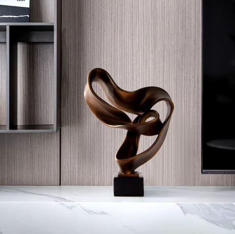 Sculpture abstraite couleur bronze en résine 45 cm