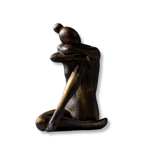 statuette femme assise
