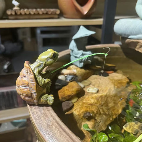 Statu tortue qui pèche 5 cm
