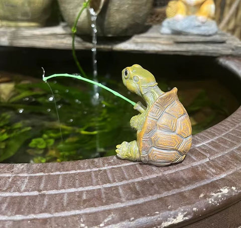 Statu tortue qui pèche 5 cm